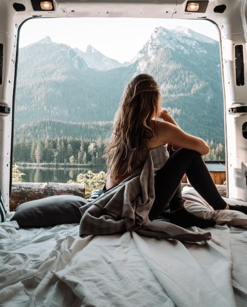 pexels-alex-azabache-4171211 woman staring out window